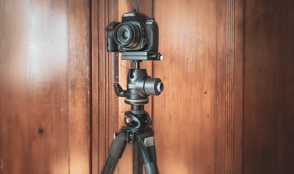 Camera on tripod with camera mount