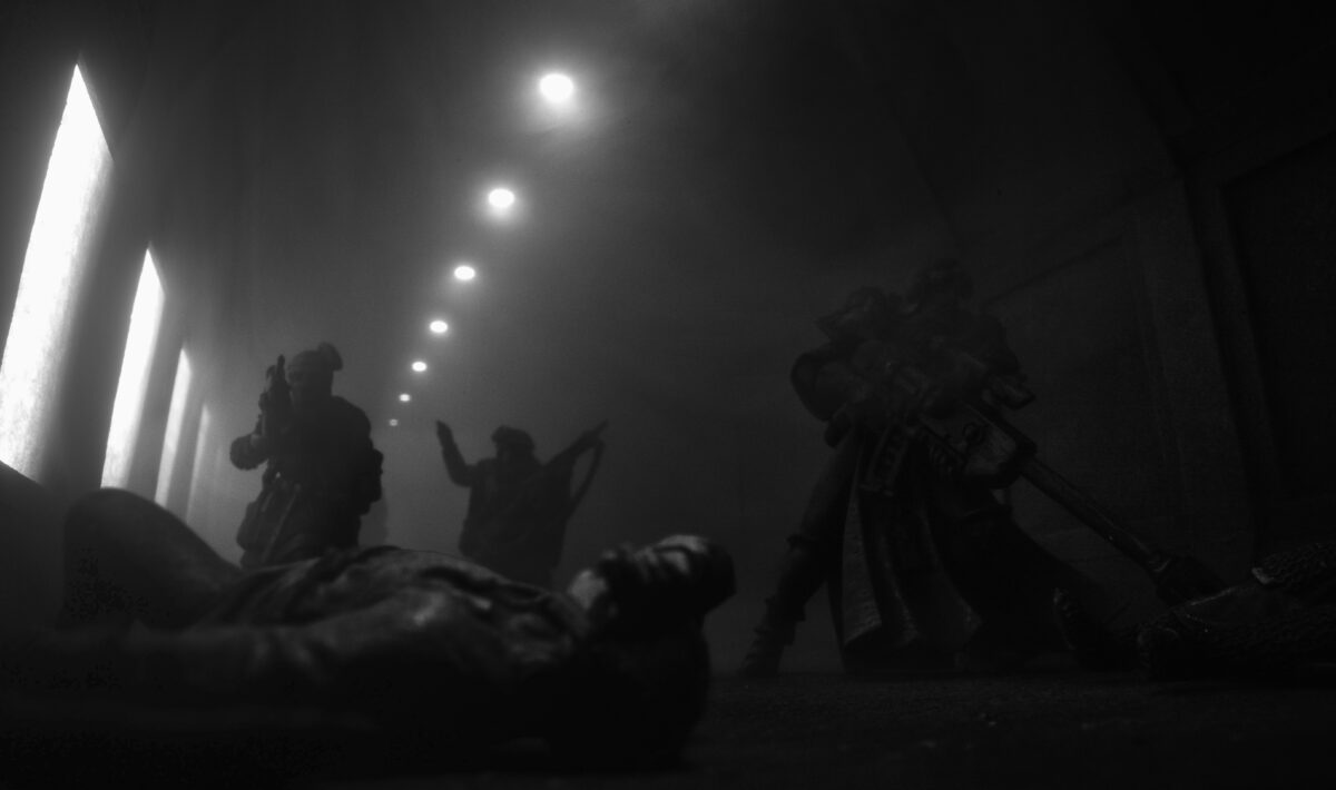Knights of Embersworn in a tunnel - black and white miniature photography